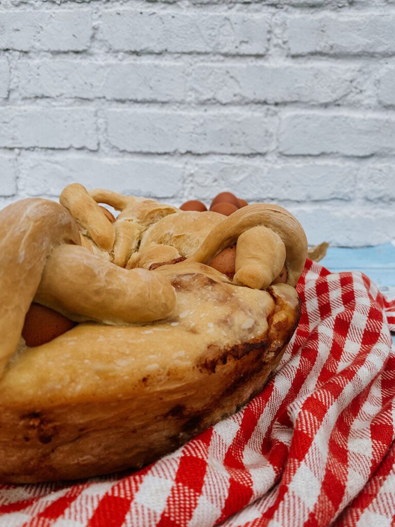close up of a side of the casatiello bread recipe on a wooden board